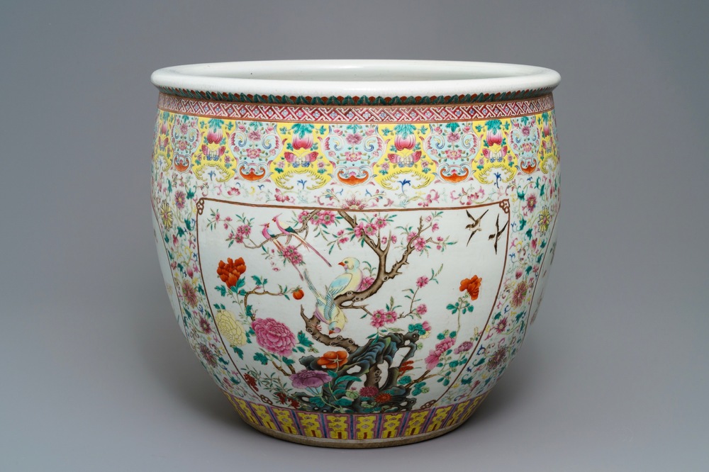 A large Chinese famille rose fish bowl with birds among flowers, 19th C.