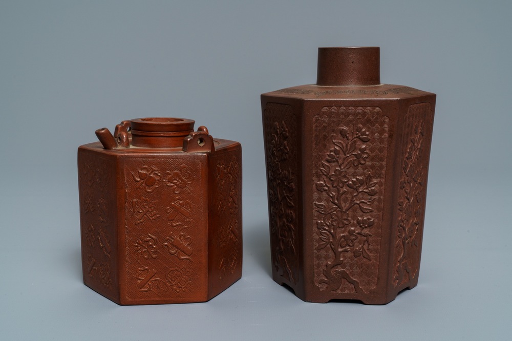 Een Chinese Yixing steengoed theebus en een theepot met reli&euml;fdecor, Kangxi