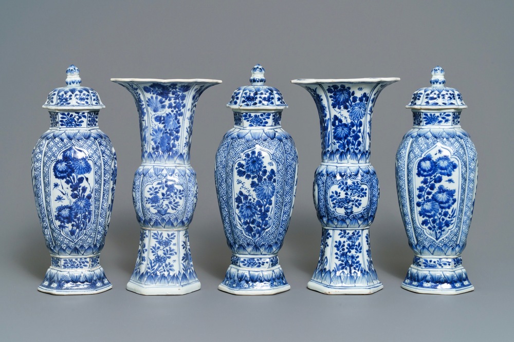 A Chinese blue and white five-piece garniture with floral design, Kangxi