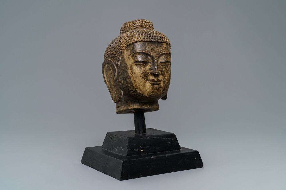 A Chinese carved stone head of Buddha Shakyamuni, Ming or later