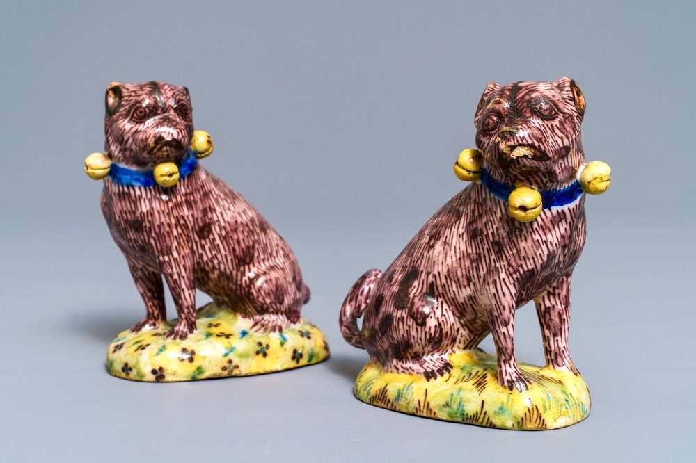 A pair of polychrome Brussels faience models of pugs, 2nd half 18th C.