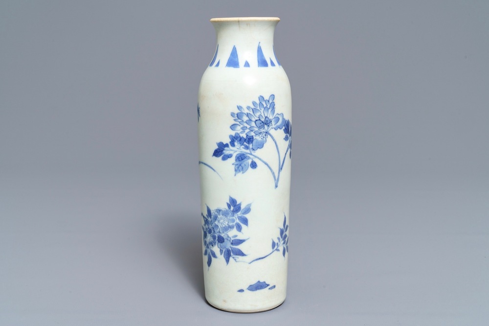 A Chinese blue and white sleeve vase with floral design, Hatcher cargo, Transitional period