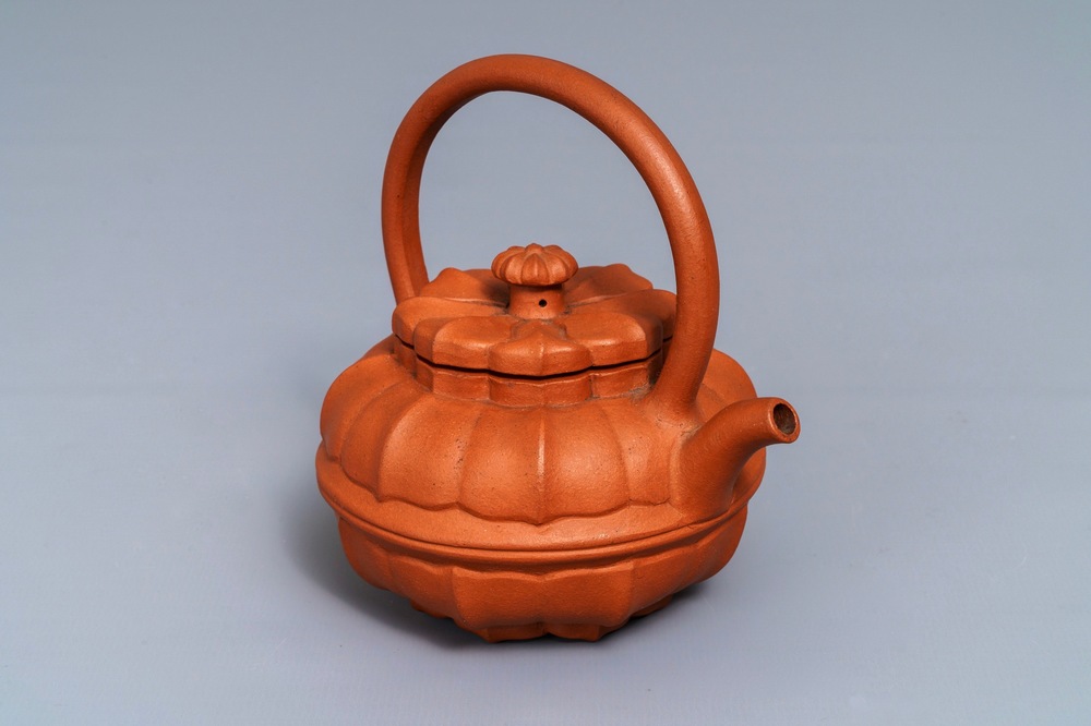 A Chinese Yixing stoneware flower-shaped teapot, Kangxi