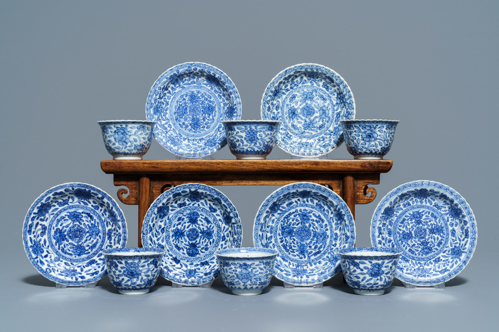Six Chinese blue and white cups and saucers with floral design, Kangxi