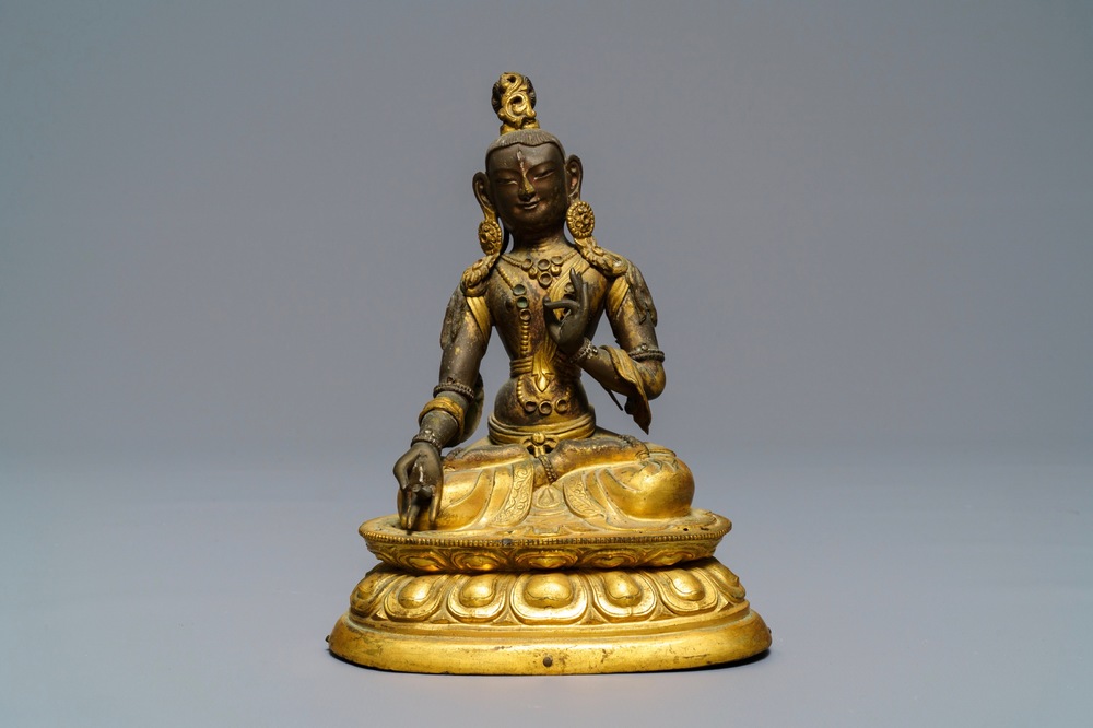 A Sino-Tibetan inlaid gilt copper alloy figure of a White Tara, 18/19th C.