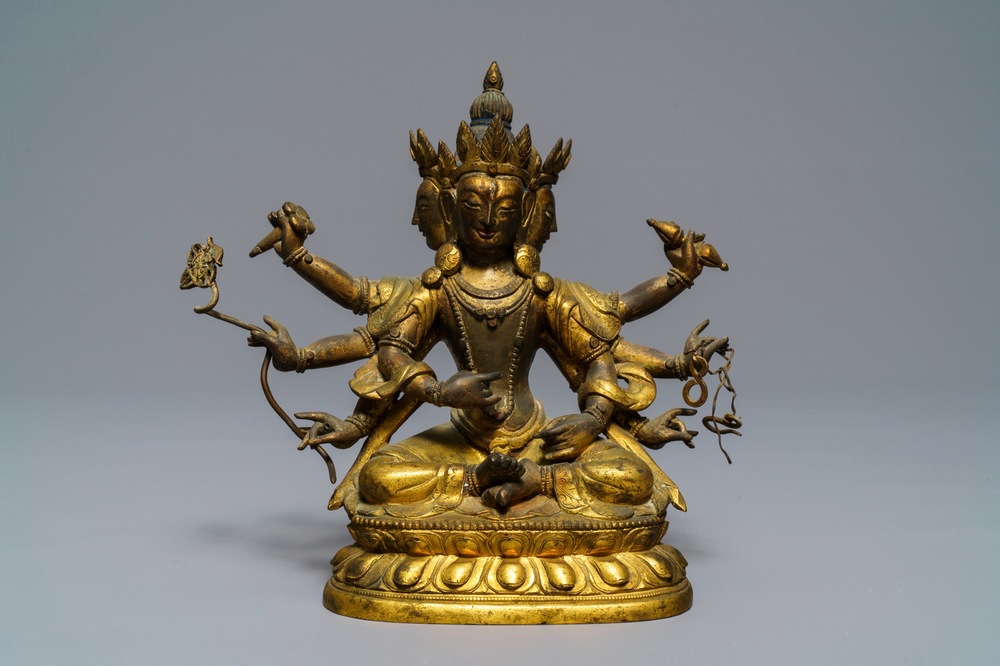 A Sino-Tibetan inlaid gilt bronze figure of Ushnishavijaya, 18th C.