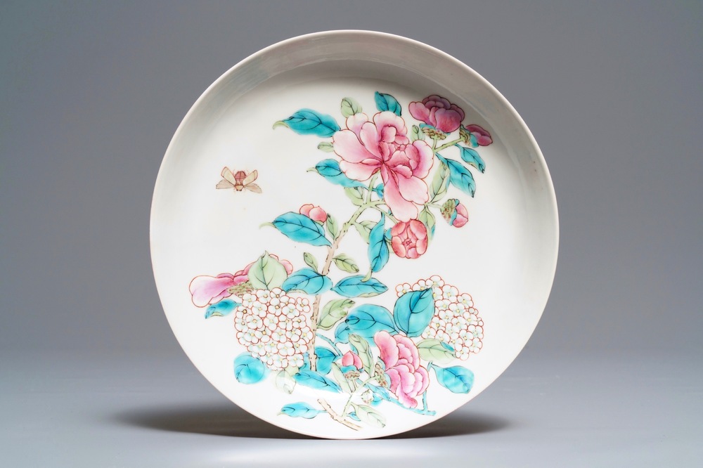 A fine Chinese famille rose 'ruby back' eggshell plate with floral design, Yongzheng