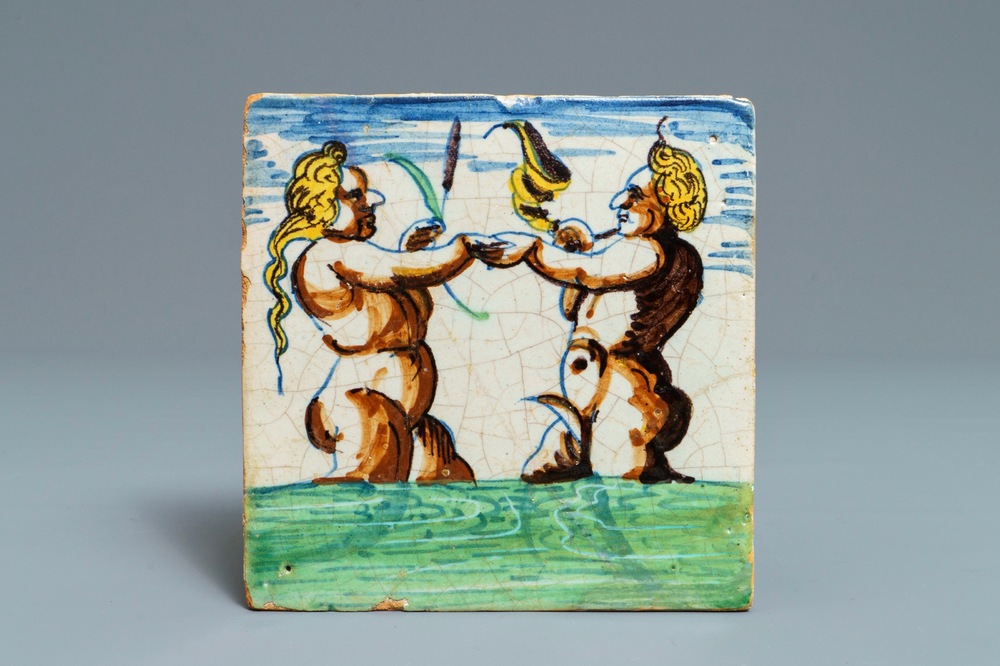 Un carreau en fa&iuml;ence de Delft polychrome &agrave; d&eacute;cor d'un Triton et d'une sir&egrave;ne, Rotterdam, 1er quart du 17&egrave;me