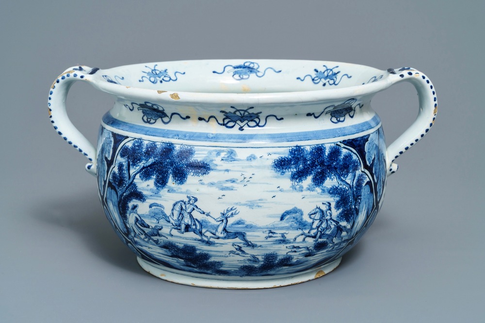 A large Dutch Delft blue and white 'deer hunting' jardiniere, 18th C.