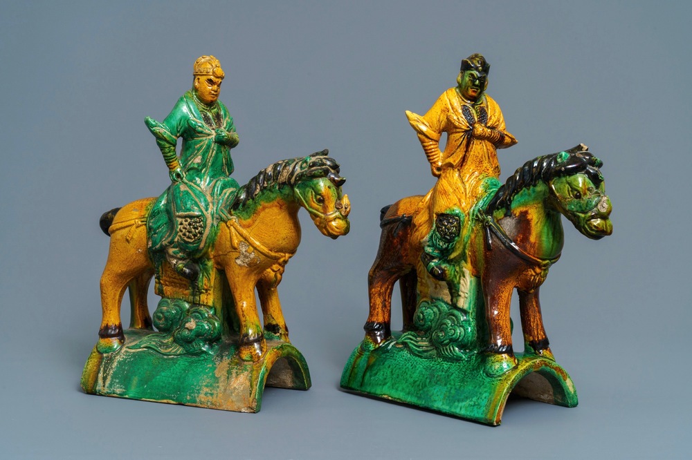 Two Chinese yellow and green-glazed 'horserider' roof tiles, Ming