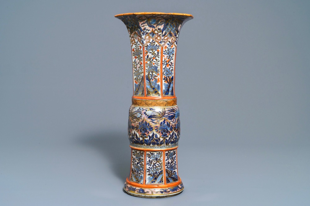 A Chinese blue and white vase with European clobbered decoration, Kangxi