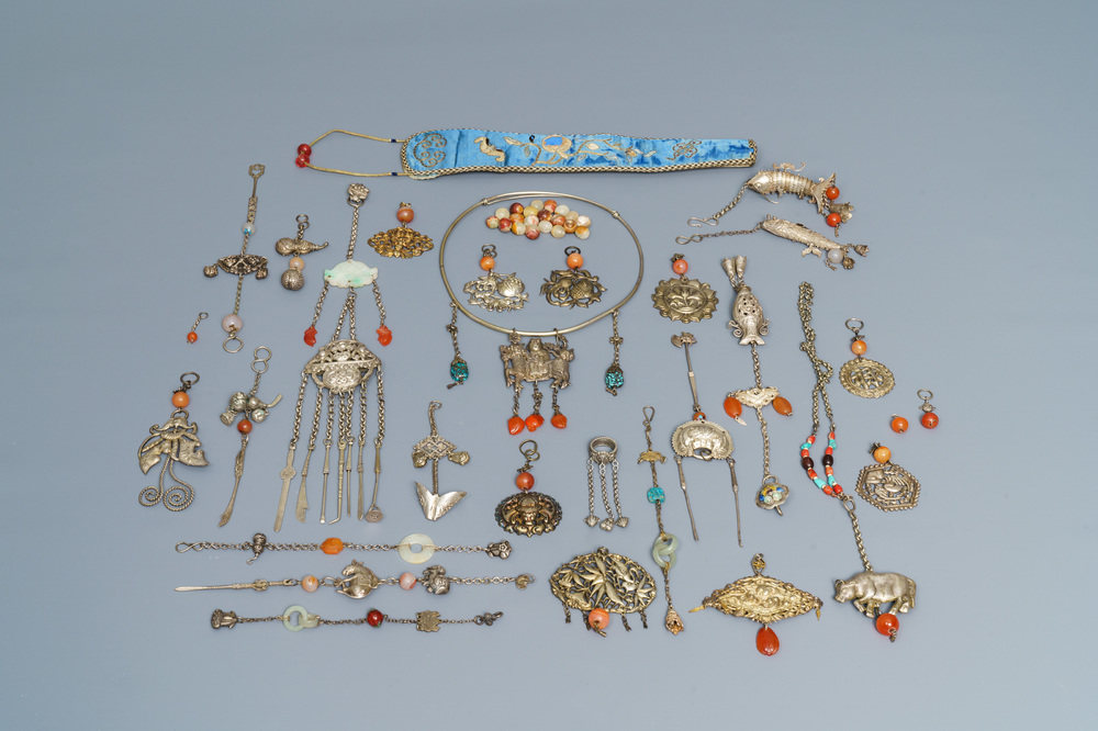 A varied collection of Chinese jade and agate-embellished silver, 19/20th C.