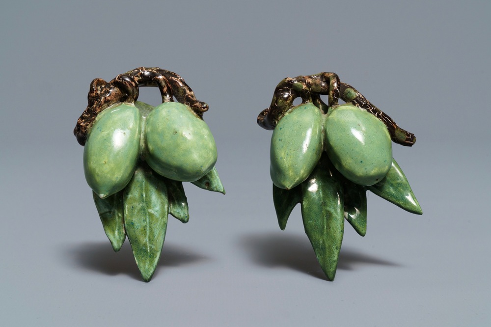 Two pairs of polychrome Dutch Delft models of olives, 18th C.