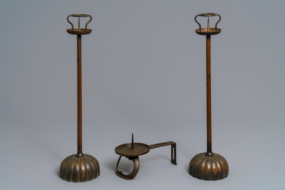 A pair of Japanese bronze shokudai candlesticks and a smaller example, Meiji/Showa, 19/20th C.