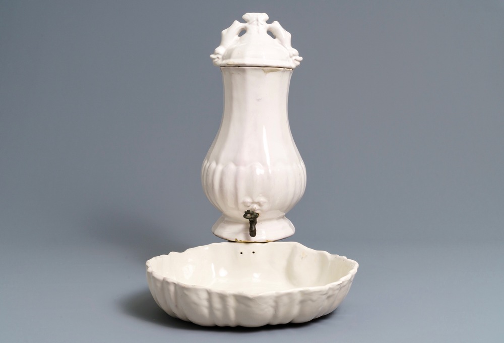 A white Delftware wall cistern and basin, prob. Kassel, Germany, 2nd half 18th C.