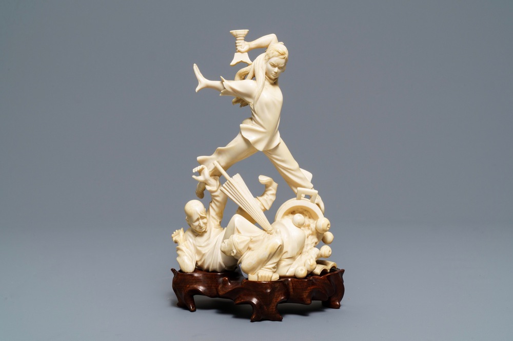 A Chinese ivory group with a fierce girl, ca. 1940