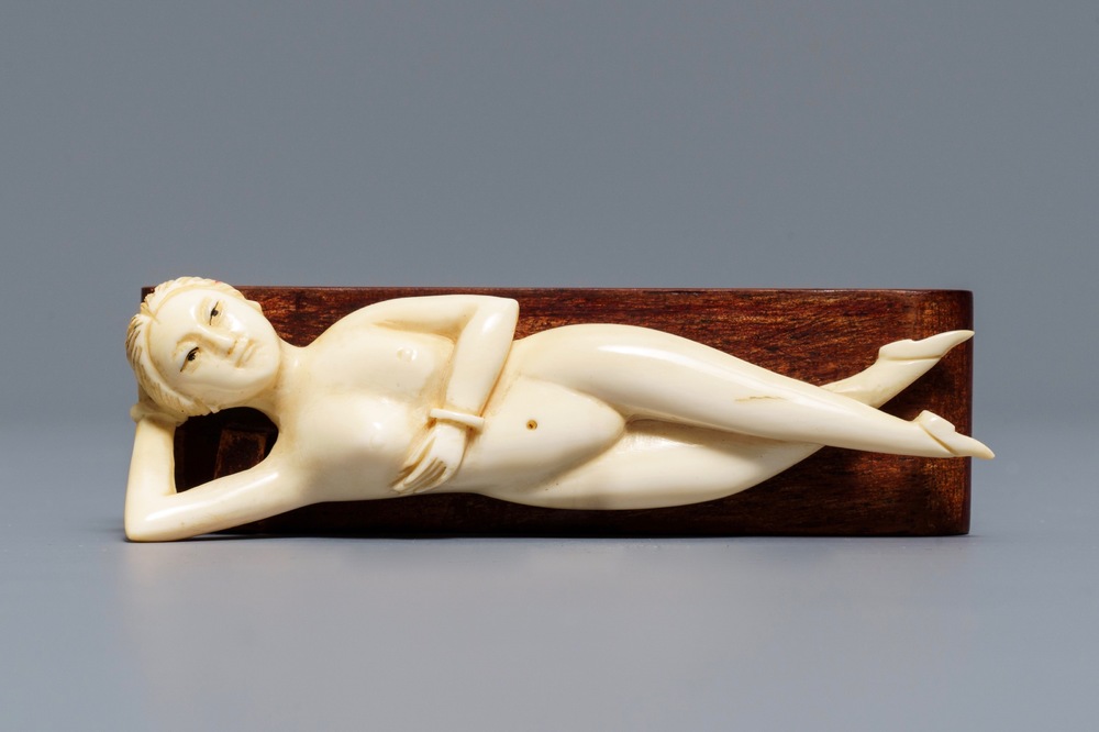 A Chinese ivory model of a doctor's lady, 19th C.