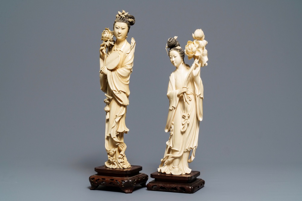 Two tall Chinese ivory carvings of ladies with flowers, 19th C.