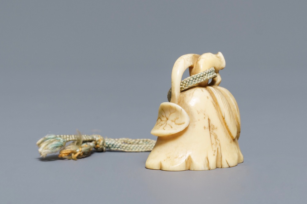 A Japanese ivory 'lotus flower' netsuke, Edo, 18th