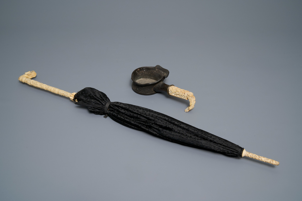 A Chinese carved ivory, bamboo and silk parasol and an bone-handled iron, Canton, 18/19th C.