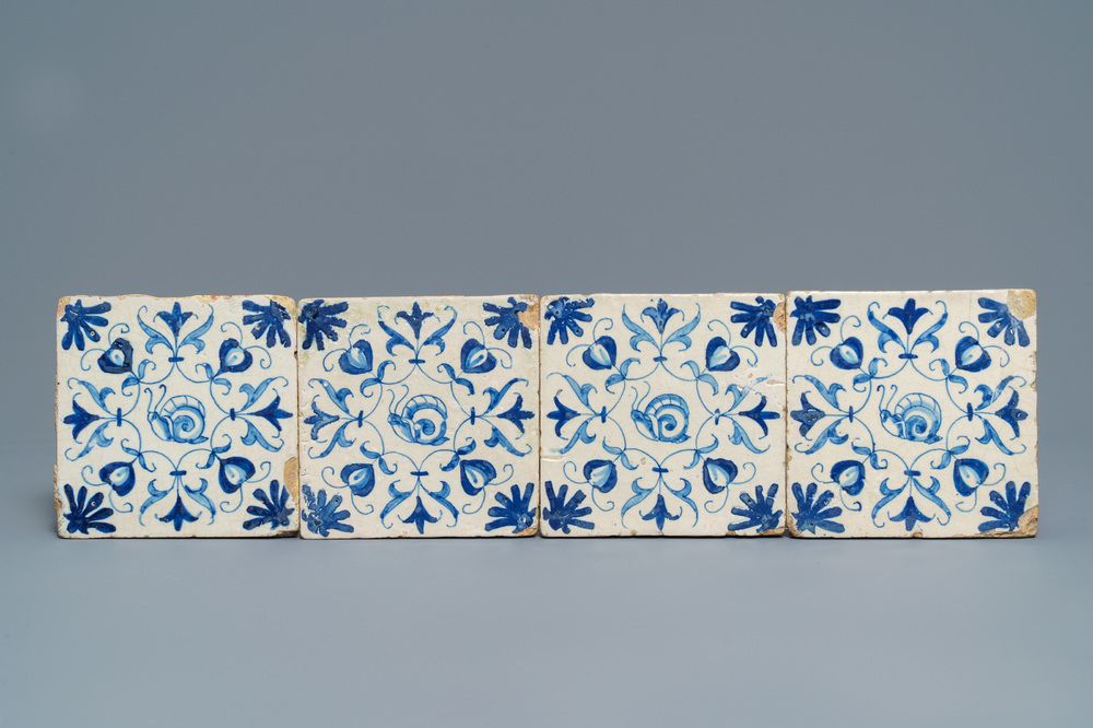 Four Dutch Delft blue and white 'snail' tiles, 1st half 17th C.