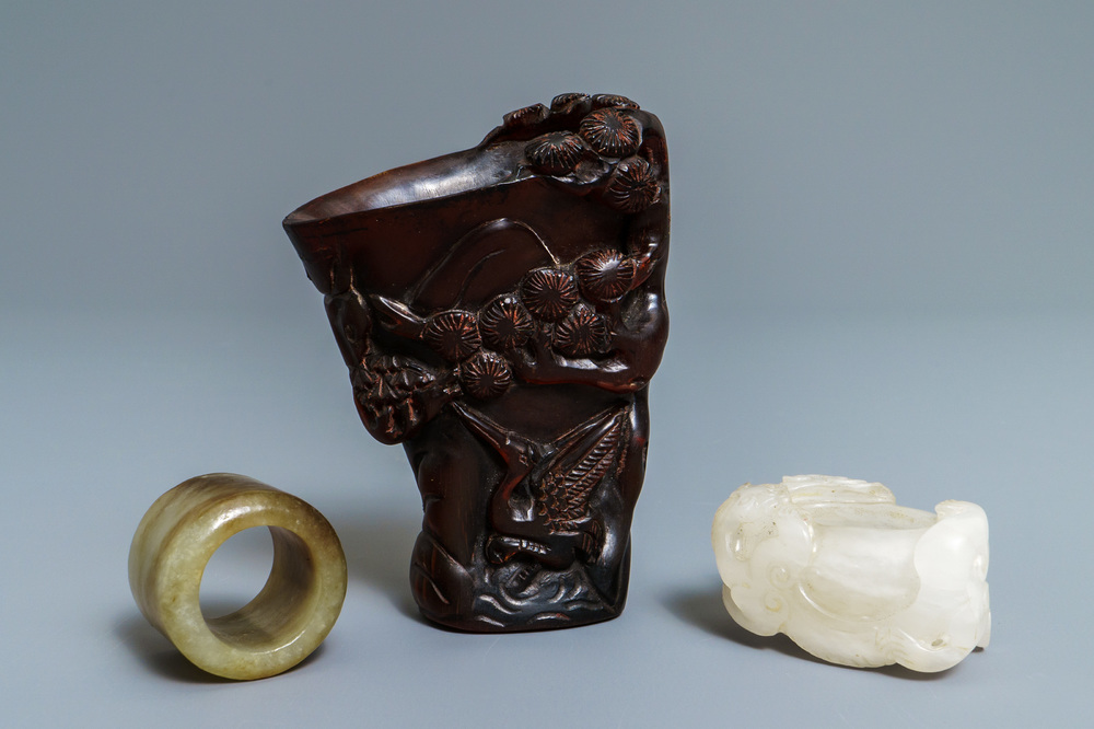 A Chinese jade archer's ring, a horn libation cup and a Beijing glass brush washer, 18th C. and later