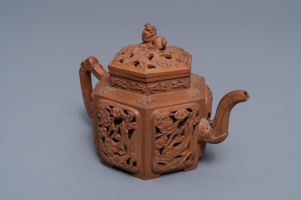 A Chinese Yixing stoneware reticulated teapot and cover, Kangxi