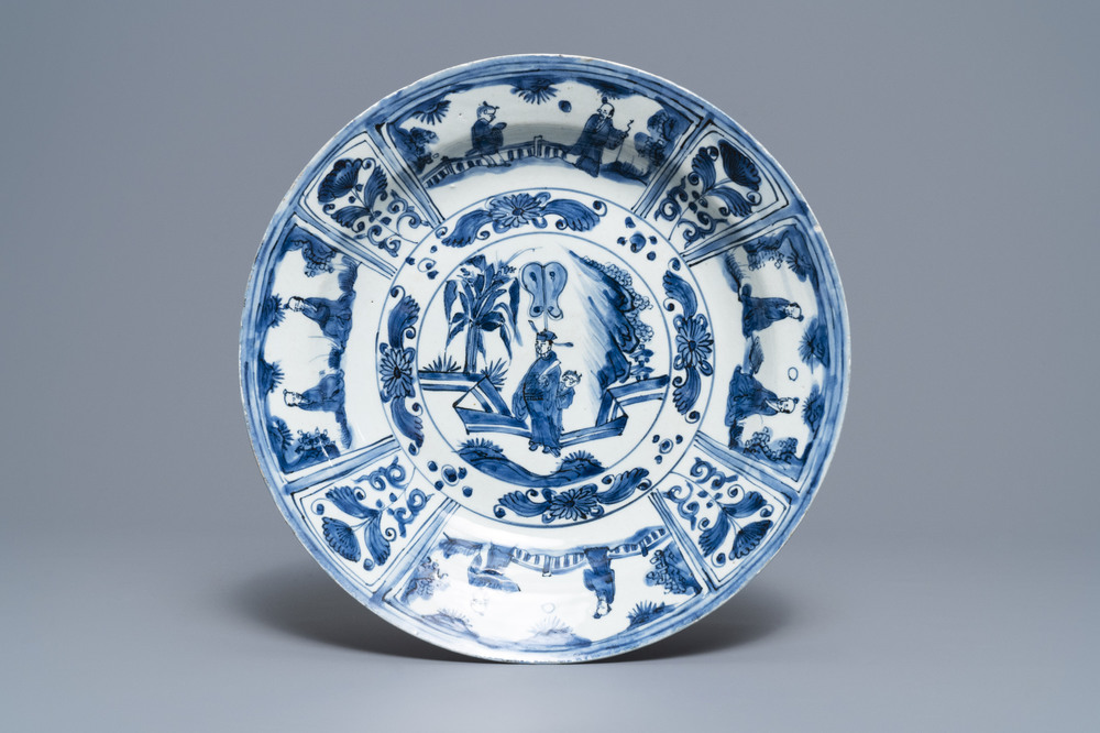 A Chinese blue and white kraak porcelain dish with figures in a landscape, Transitional period