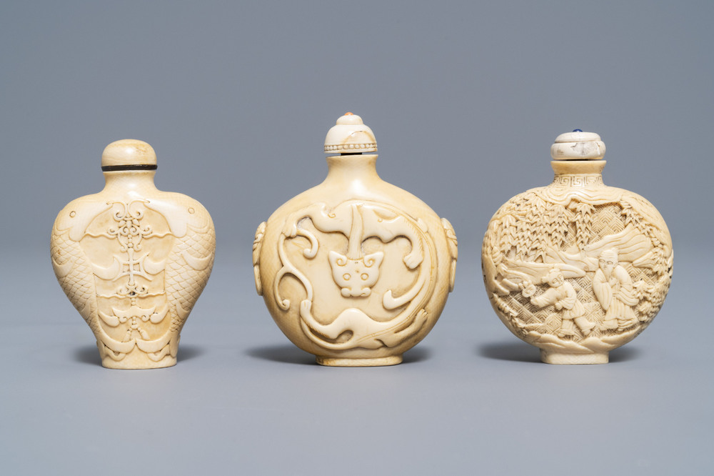 Three Chinese carved ivory snuff bottles, 19th C.