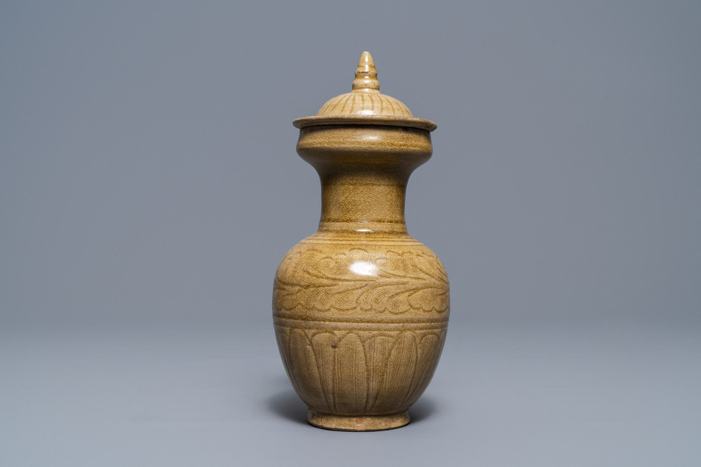 A Chinese brown-glazed vase and cover with incised design, Song