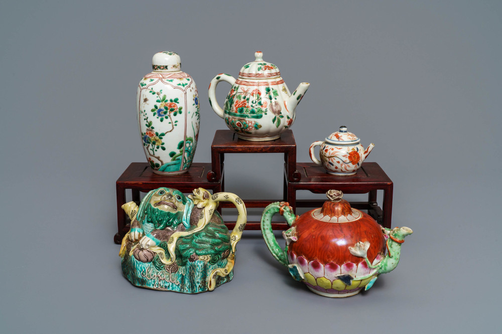 Four Chinese famille rose, verte and Imari-style teapots and a tea caddy, Kangxi and later