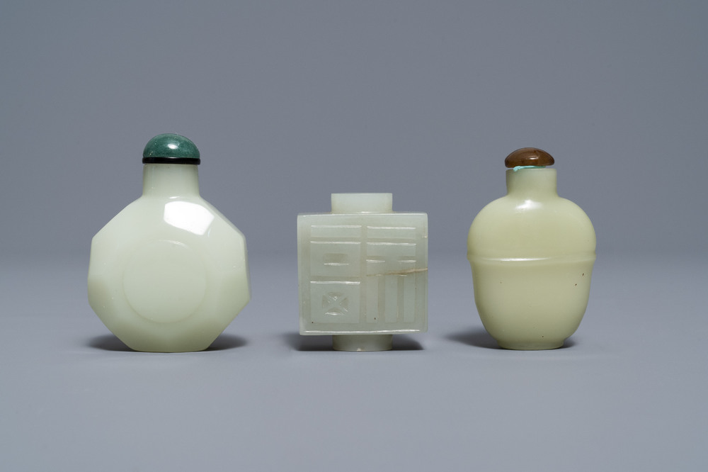 Three Chinese pale celadon jade snuff bottles, 19th C.