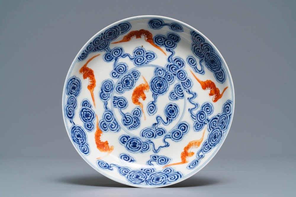 A Chinese blue, white and iron red 'bats and clouds' plate, Guangxu mark, 19/20th C.