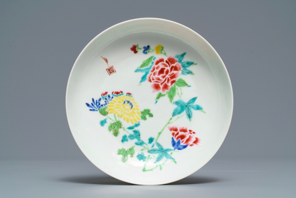 A Chinese famille rose 'boneless style' saucer dish, Yongzheng mark and of the period
