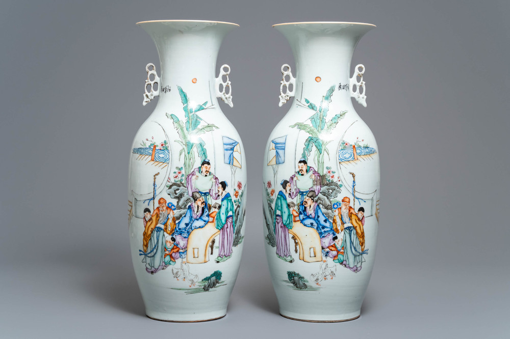 A pair of Chinese famille rose vases with scholars in a garden, 19/20th C.