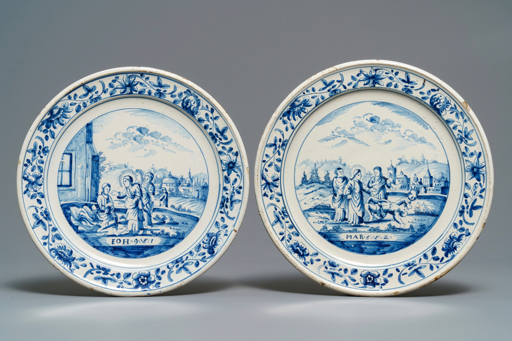 A pair of blue and white Dutch Frisian Delftware biblical plates, Makkum, 18th C.