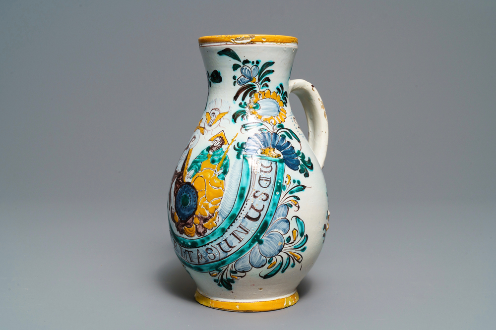 A Habaner pottery 'Holy Trinity' jug, Slovakia, dated 1820