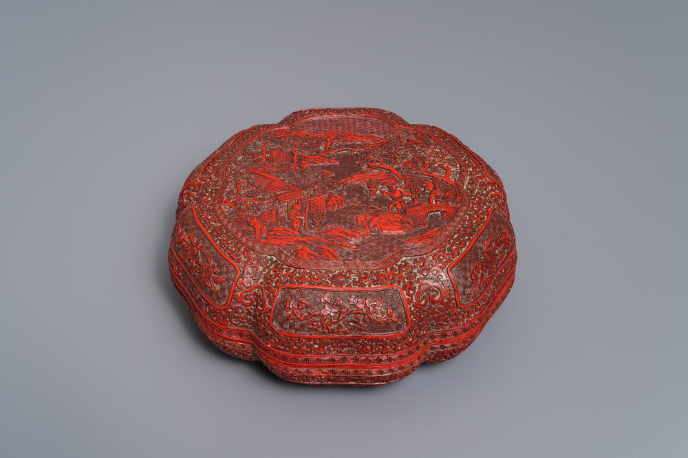 A Chinese cinnabar lacquer box and cover with figures in a landscape, 19th C.
