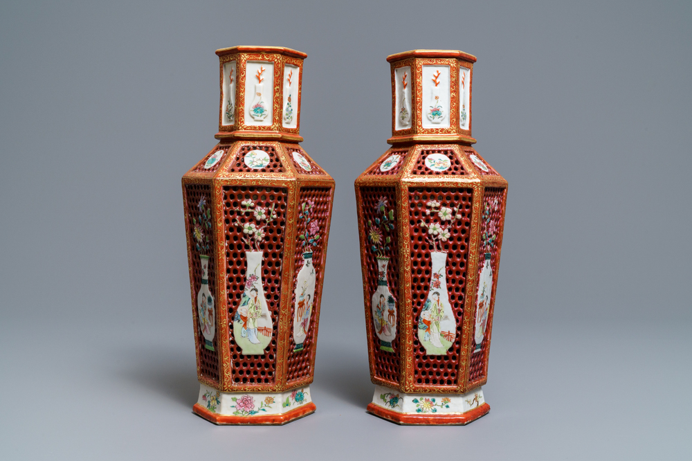 A pair of Chinese reticulated double-walled hexagonal famille rose vases, Yongzheng