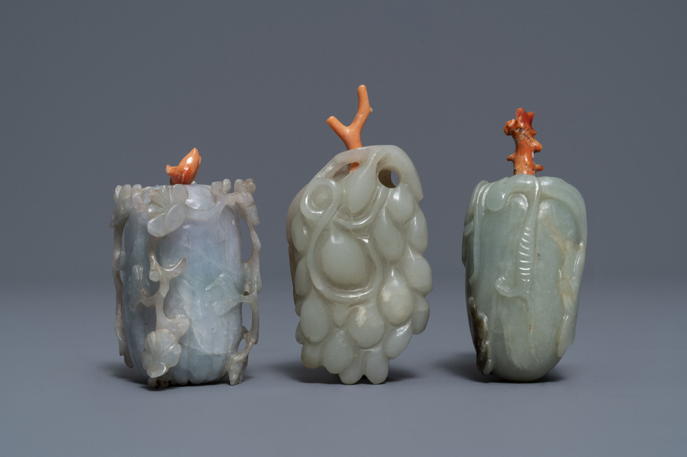 Three Chinese jade snuff bottles with coral stoppers, 19/20th C.