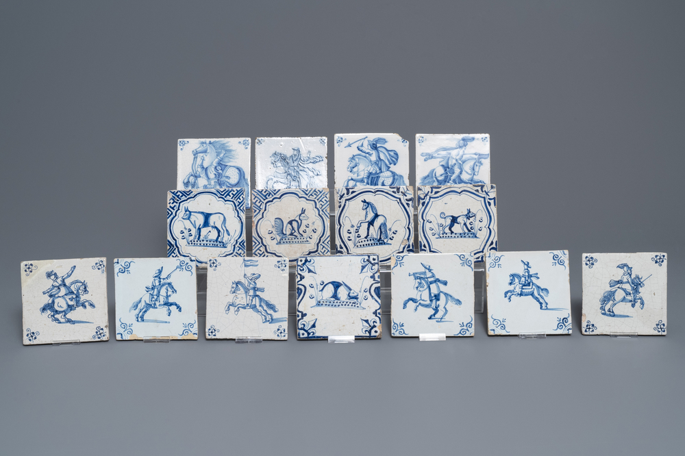 Fifteen Dutch Delft blue and white tiles with horseriders and animals, 17/18th C.
