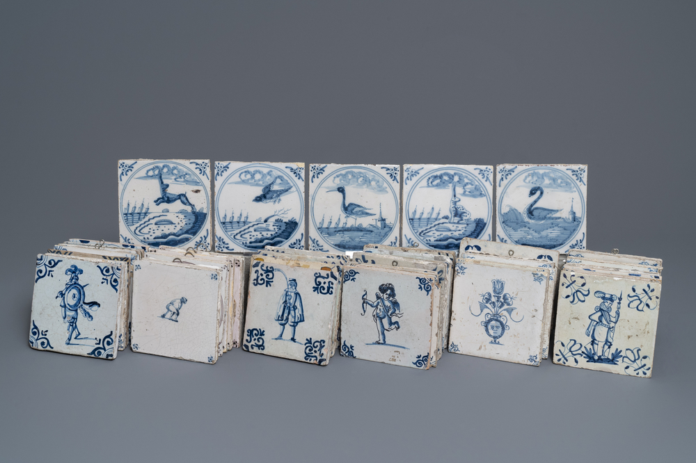 A collection of 54 Dutch Delft blue and white and manganese tiles, 17/18th C.