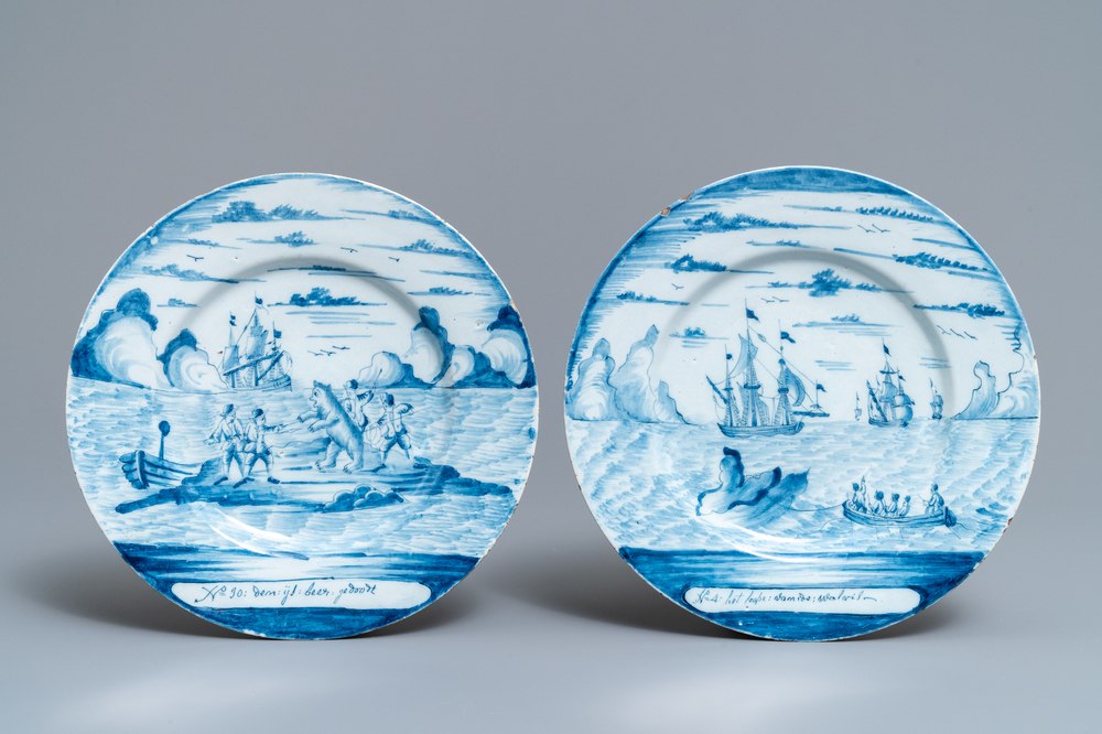 A pair of Dutch Delft blue and white 'whaling' plates, 18th C.