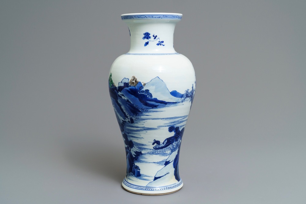 A Chinese blue and white 'river landscape' baluster vase with overglaze accents, Kangxi
