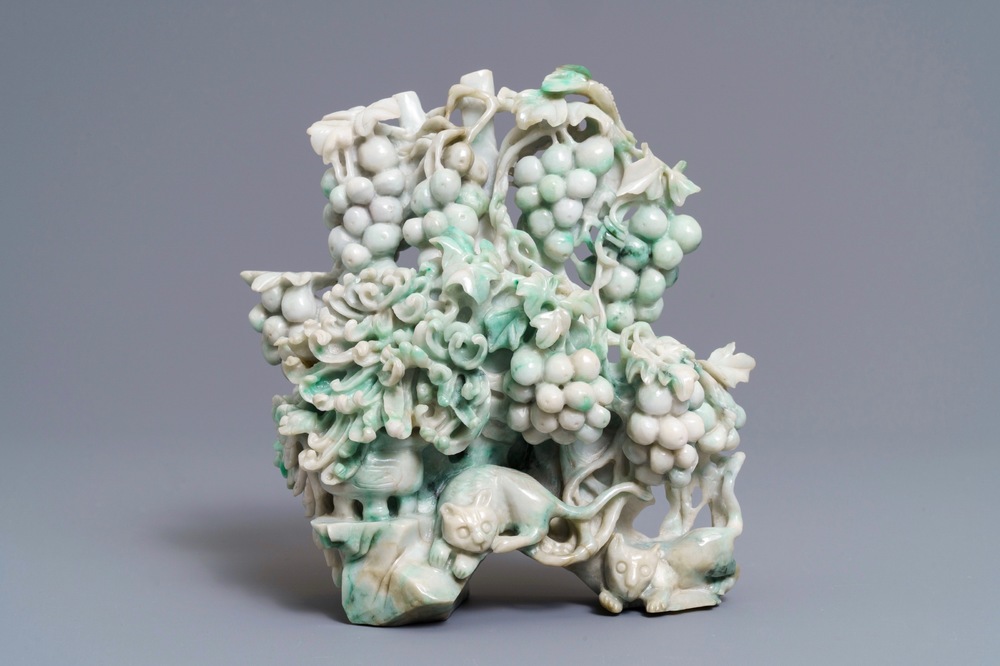 A Chinese jadeite carving of two cats among grapes and flowers, 20th C.