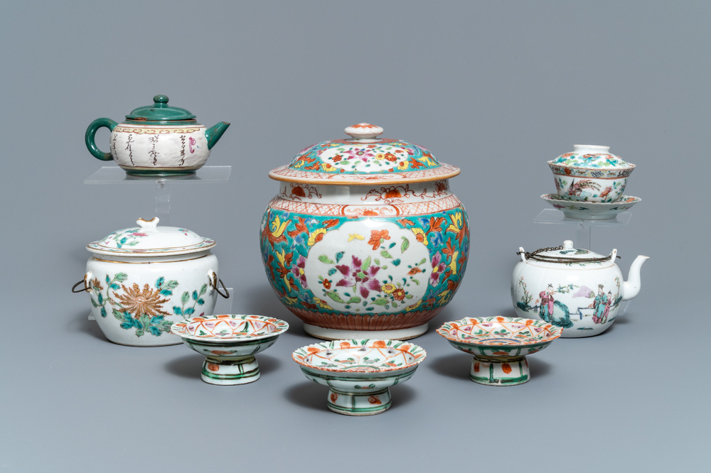 A collection of Chinese famille rose porcelain and a Yixing stoneware teapot, 18/19th C.