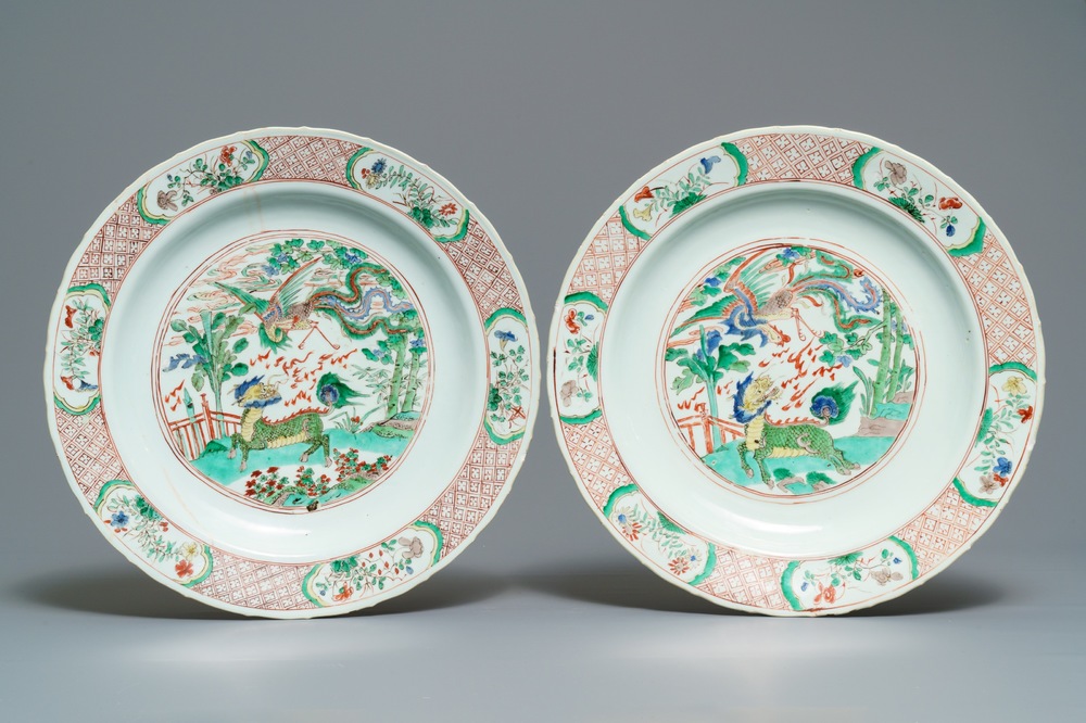 A pair of Chinese famille verte 'qilin and phoenix' dishes, Kangxi