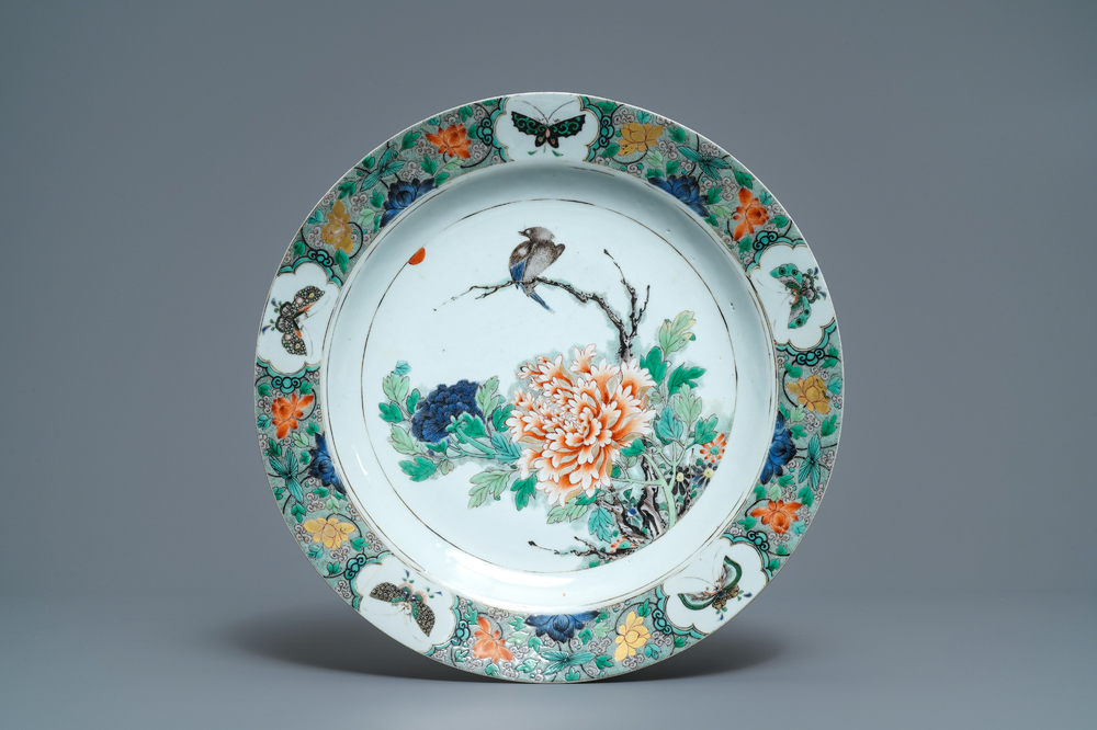 A Chinese famille verte charger with a bird, flowers and butterflies, Kangxi