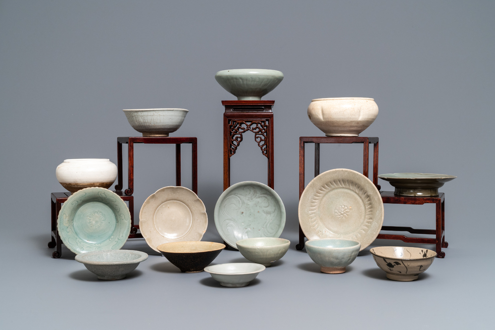 A collection of 15 Chinese celadon- and cream-glazed wares, Song and later