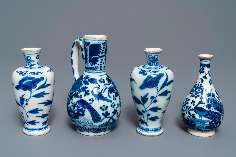 Three Dutch Delft blue and white vases and a chinoiserie jug, 17/18th C.